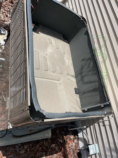 Cleaning AC unit outside